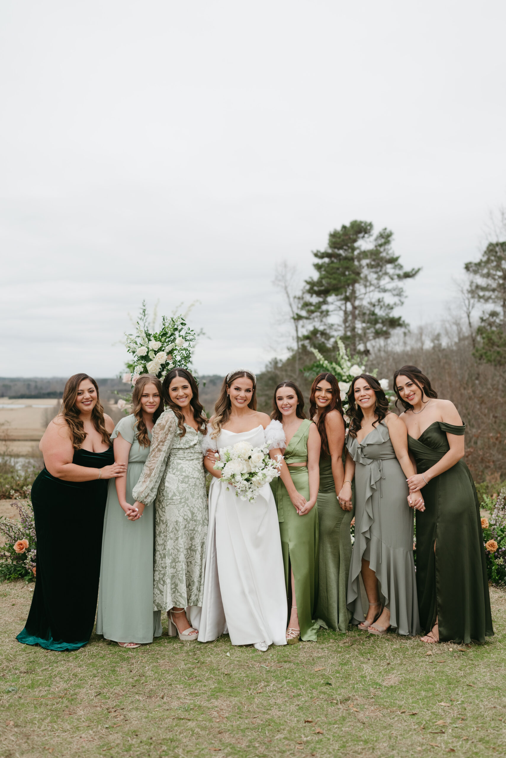 These green bridesmaid dresses brought a garden party feel to a cold December wedding at Foxhall Resort. | Megan Kuhn Photography